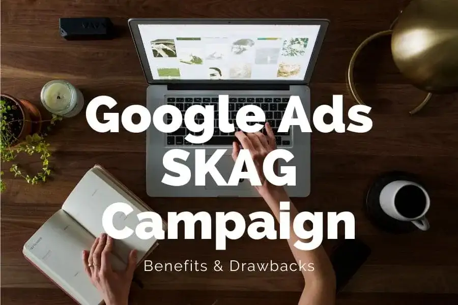 Hands typing on a laptop on a wooden desk, with the title Google Ads SKAG Campaign: Benefits & Drawbacks over the photo.