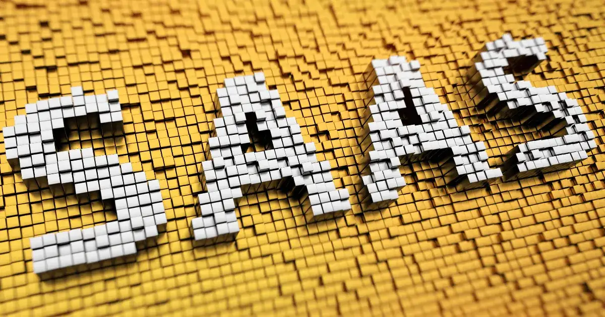 The letters SaaS built from white 3D cubes on a yellow cube background